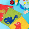 Drawstring Bags - 12-Pack Party Favor Bags for Kids Dinosaur Birthday, 3 Assorted Designs, Goodie Treat Bags, Dino Themed Party Supplies, For Giveaways and Gifts, Green, Red, Yellow, 9.7 x 12 Inches