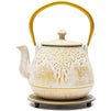 White and Gold Cast Iron Teapot with Trivet in a Leaf Design (32 Ounces)