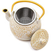 White and Gold Cast Iron Teapot with Trivet in a Leaf Design (32 Ounces)